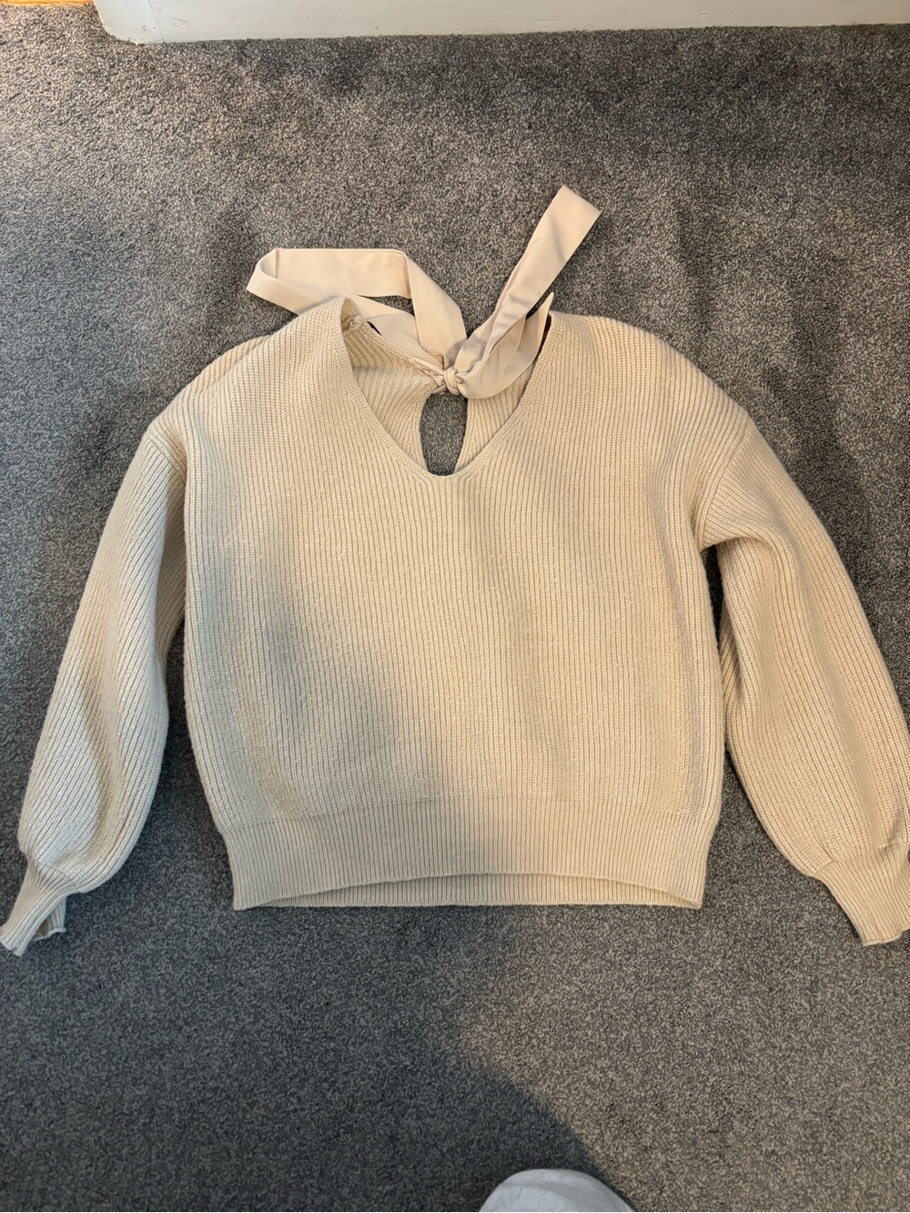 Women’s Cream Knit V-Neck Sweater with Back Tie